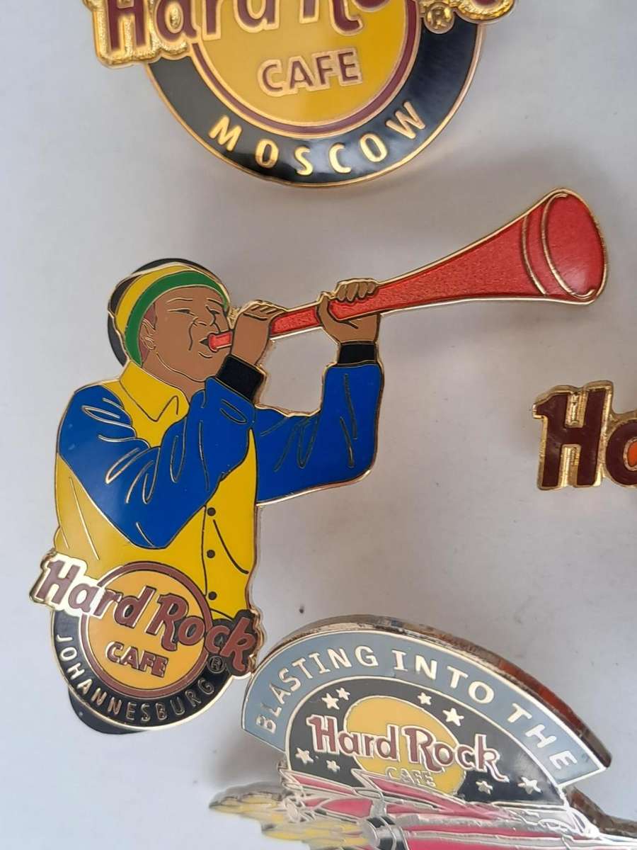 Hard Rock Cafe vintage pin badges  7 in total, one being the classic old style Hard Rock logo