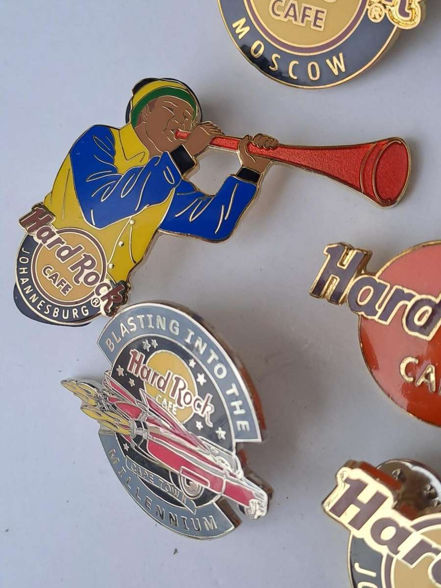 Hard Rock Cafe vintage pin badges  7 in total, one being the classic old style Hard Rock logo