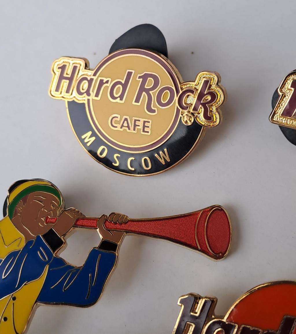 Hard Rock Cafe vintage pin badges  7 in total, one being the classic old style Hard Rock logo