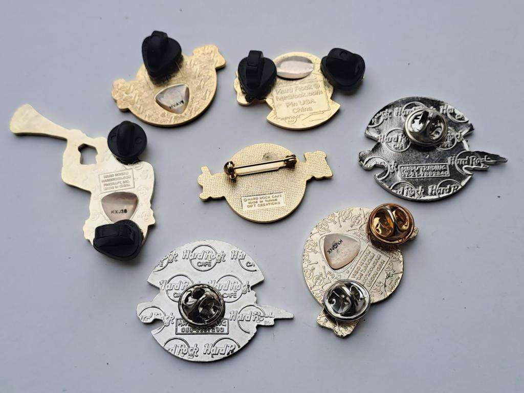 Hard Rock Cafe vintage pin badges  7 in total, one being the classic old style Hard Rock logo