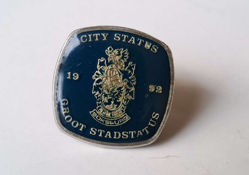 South African Historical pin badges of cities and towns eg: Benoni, Brakpan, Edenvale, etc. 8 badges