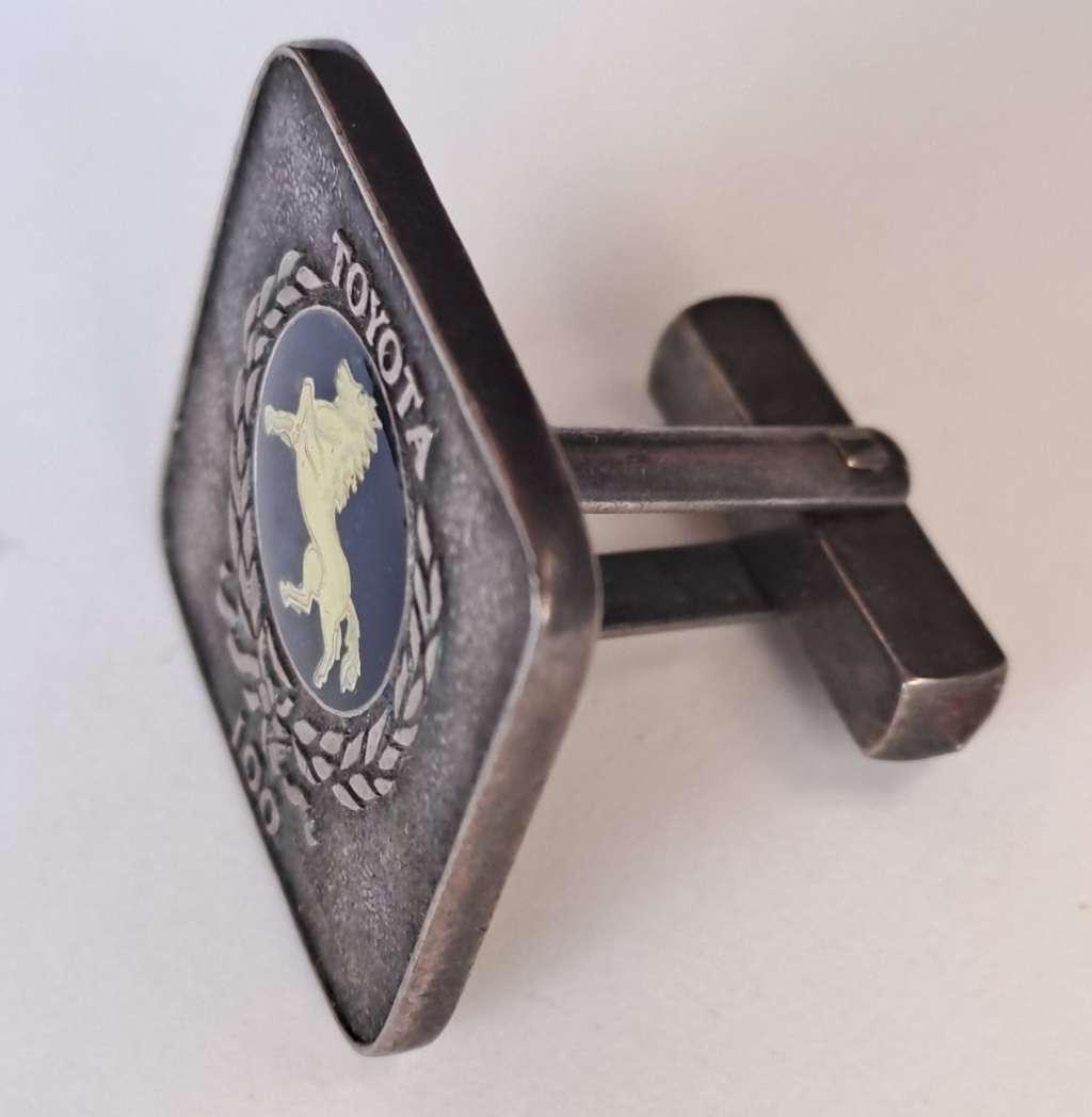 Toyota SA  Rare South African Toyota prancing horse cufflinks plus a 1981 20th Anniversary badge