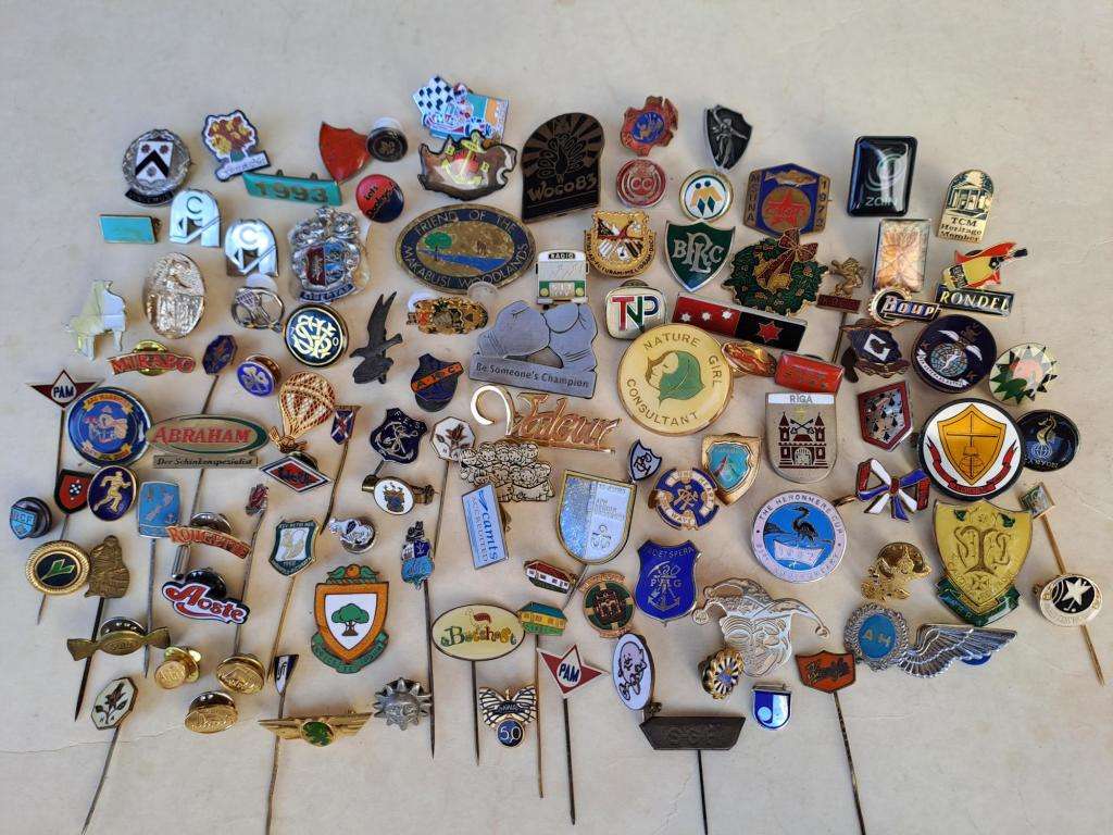 100 pin badges in all sizes and subject matter