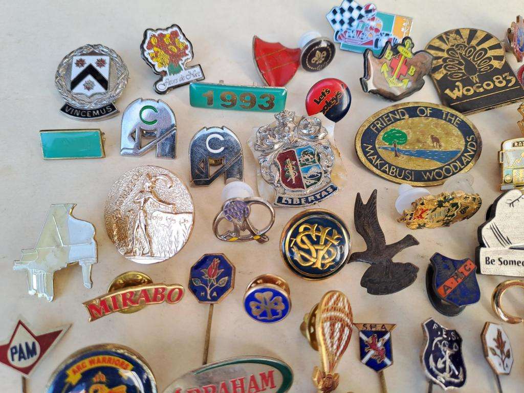 100 pin badges in all sizes and subject matter
