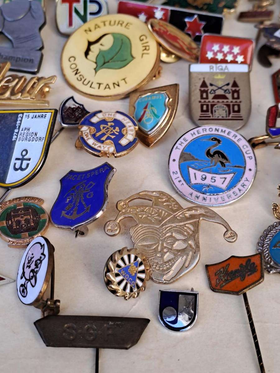 100 pin badges in all sizes and subject matter