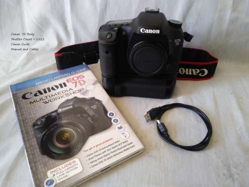 Canon 7D DSLR Body only with Battery Grip. 3 x Battery chargers and 8 x LP-E6 Battries. Extras.