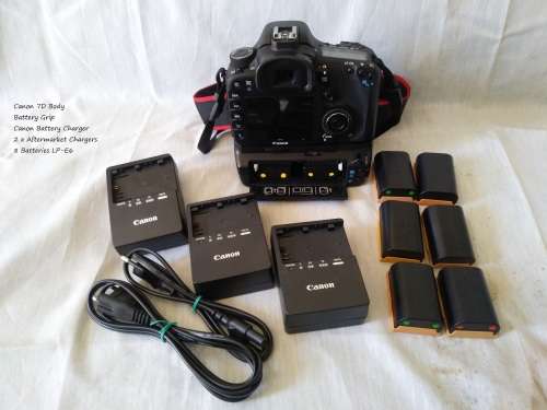 Canon 7D DSLR Body only with Battery Grip. 3 x Battery chargers and 8 x LP-E6 Battries. Extras.