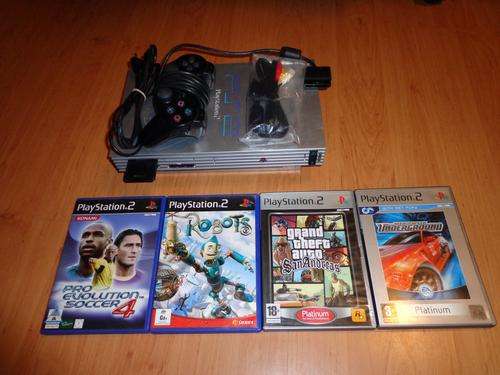 PlayStation 2 console with games