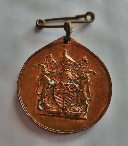 ## 1939-1945 World War Rhodesian Commemorative Medallion ##