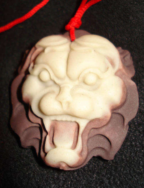 *** CARVED ZI PAO JADE LION HEAD PENDANT ***