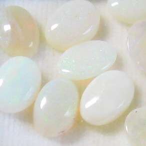 Incredible .60 ctw each Genuine White Opal with Oval Shape and Cabochon cut, 7x5 mm each