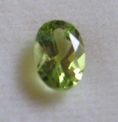 Wonderful Oval Cut FUN KIWI TOPAZ, .60ct 6x4mm
