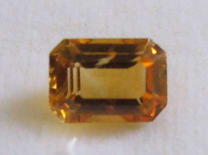 FINE BRAZILIAN Emerald cut CITRINE, .60ct 7x5mm