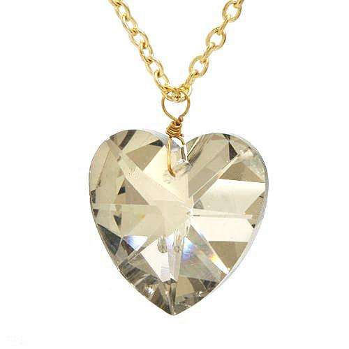 Stunning Brand New Heart Necklace With Genuine Crystals Crafted in Yellow Base metal.