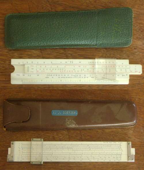 Two antique slide rulers