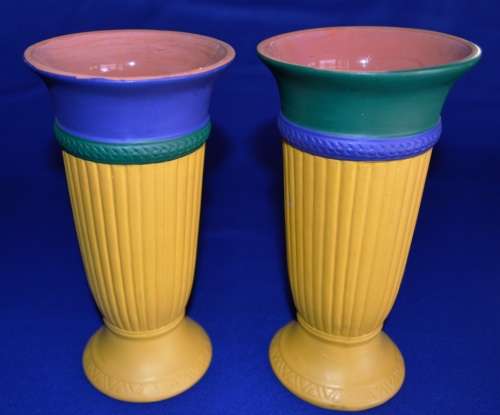 A set of Matching Ceramic Vases
