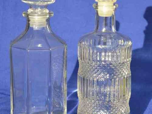 TWO GLASS DECANTERS