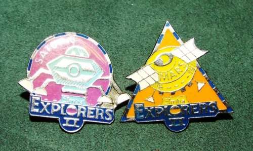 EXPLORER11 ,,,,2 ENAMEL BADGES  ON R1 START