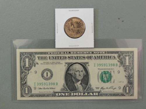 One Dollar Note and Coin