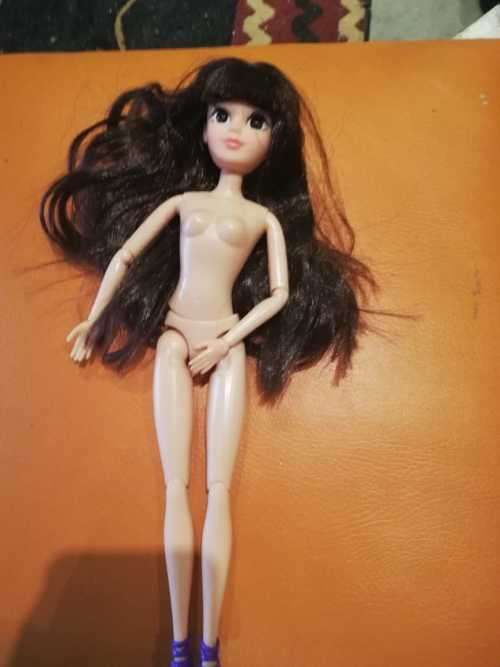 Fully Articulated Asian Doll  with rooted lashes