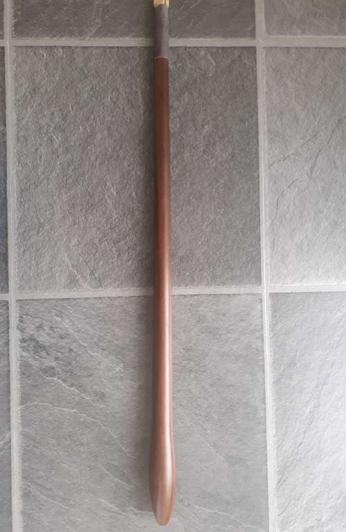 Imbuia wood and genuine leather whip.