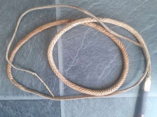 Imbuia wood and genuine leather whip.