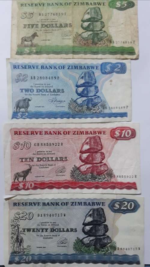 4x zimbabwe notes as per photo