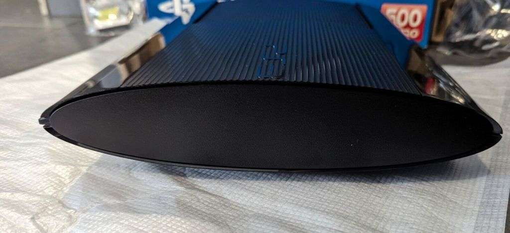 PS3 Superslim with Box 500gb with 54 games 44 on hardrive 10 on Game disk