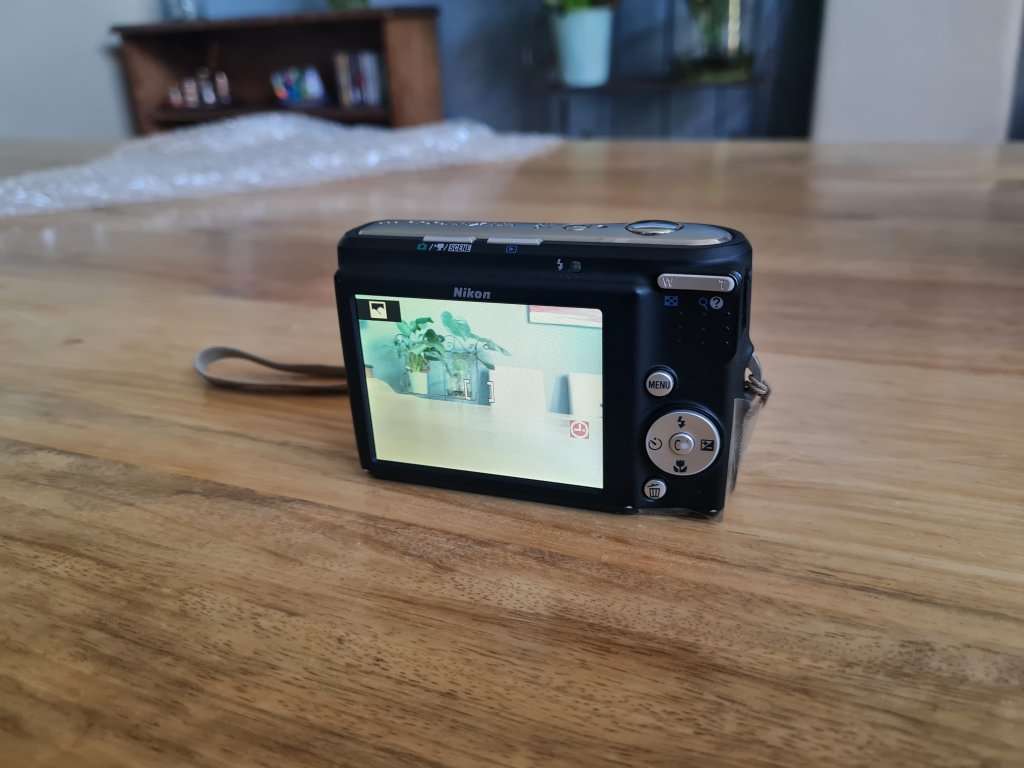 Nikon Coolpix pocket camera + 32GB of SD Cards