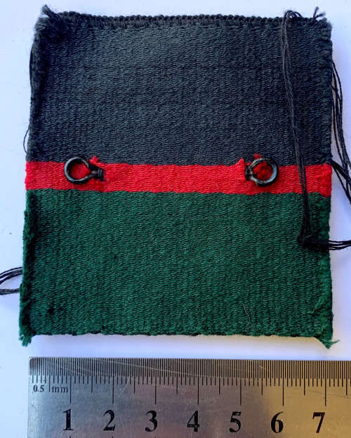 HS095 - Rhodesia Regiment badge on cloth Corps colours backing