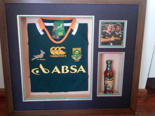 Framed SA rugby jersey signed Victor Matfield and Bakkies Botha.