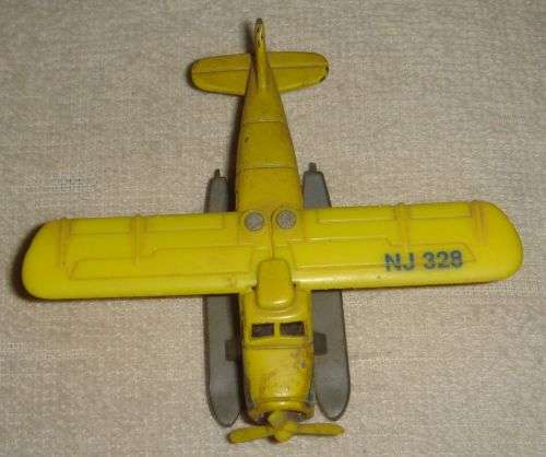 A COLLECTION OFF SMALL METAL AIRPLANES