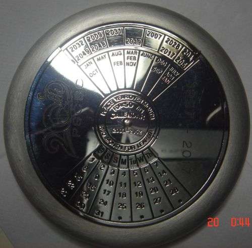 Original Cast Metal Millennium Paper Weight! Calendar works from 2003-2052