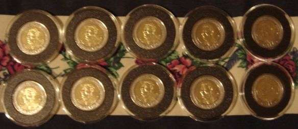 MADIBA BIRTHDAY COIN WITH BLACKRING IN CAPSULE