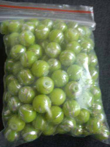 Green beads with silver inlay