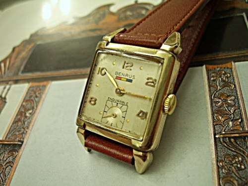 VINTAGE 1940'S BENRUS - ENDURABLE - WITH RED, YELLOW, BLUE LOGO