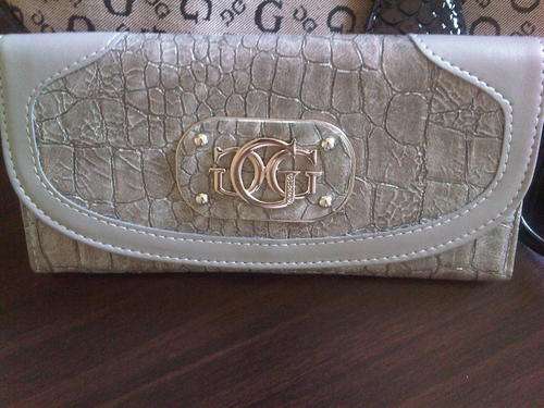 Gorgeous grey Brand new Guess wallet with tags.