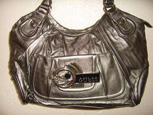ELEGANT BRONZE GUESS BAG FOR LADIES ........