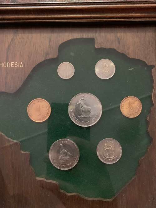 Rhodesian Coin And Stamp Plaq Sets