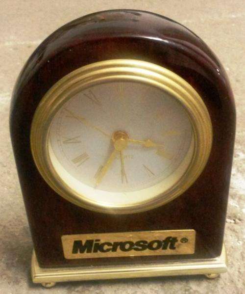 nice microsoft branded wooden footed desk/mantel  clock