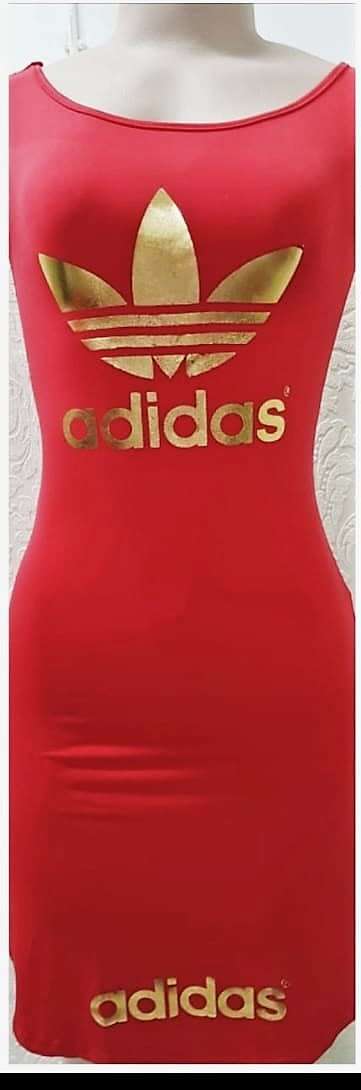 Factory overruns ADIDAS LADIES FITTED MINI DRESS ...WOW CLEARANCE with slight defects see descriptio