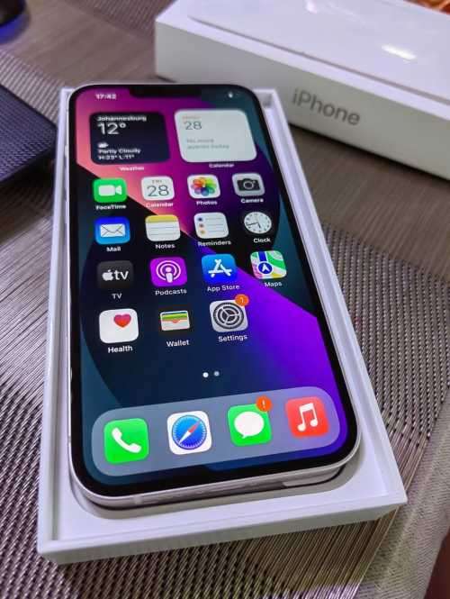 APPLE IPHONE 13...5G***BRAND NEW ***128 GB **starlight  COLOUR ***BARGAIN WOW