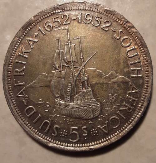 UNION 1952 SILVER CROWN, DAMAGE TO RIM JUST ABOVE THE DATES, A NICE COIN, IN CAPSULE