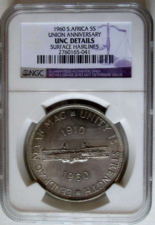 1960 SILVER CROWN NGC GRADE UNC DETAILS....CRACKED DIE VARIETY.