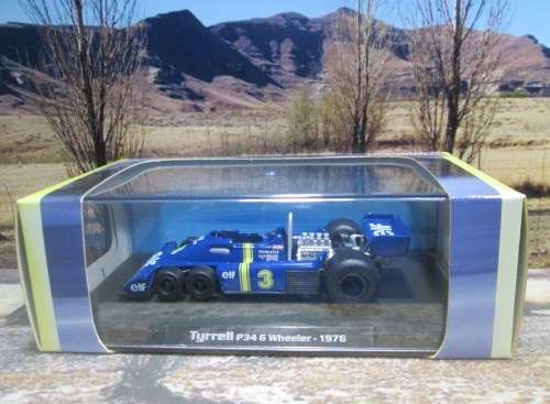 ATLAS / IXO  - 1976  TYRRELL P34  6 WHEELER    `JODY SCHECKTER `   ` MINT - BOX AND DISPLAY CASE