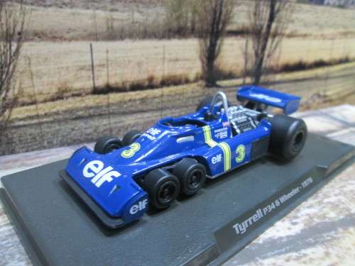 ATLAS / IXO  - 1976  TYRRELL P34  6 WHEELER    `JODY SCHECKTER `   ` MINT - BOX AND DISPLAY CASE