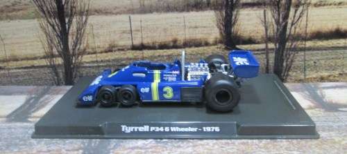 ATLAS / IXO  - 1976  TYRRELL P34  6 WHEELER    `JODY SCHECKTER `   ` MINT - BOX AND DISPLAY CASE