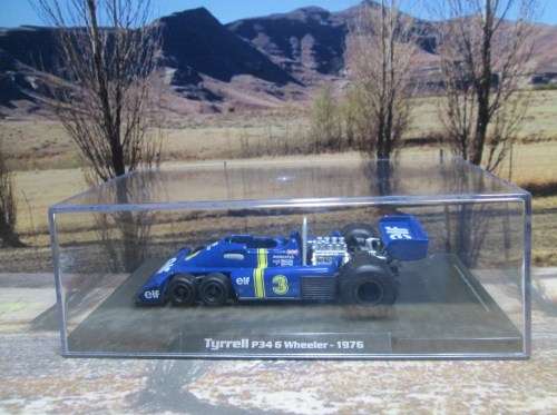 ATLAS / IXO  - 1976  TYRRELL P34  6 WHEELER    `JODY SCHECKTER `   ` MINT - BOX AND DISPLAY CASE