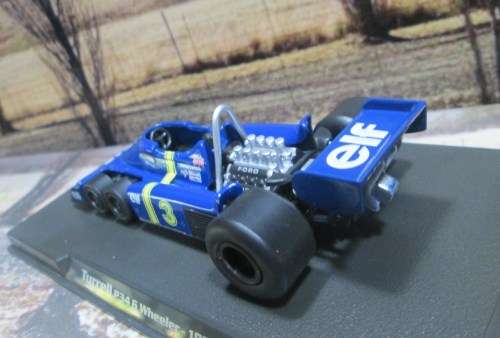 ATLAS / IXO  - 1976  TYRRELL P34  6 WHEELER    `JODY SCHECKTER `   ` MINT - BOX AND DISPLAY CASE
