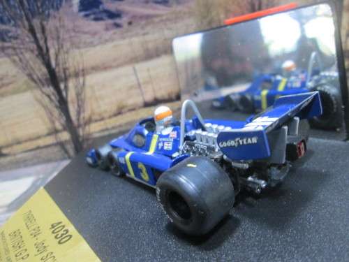 QUARTZO  NO 4030  -  TYRRELL P34  ` JODY SCHECKTER ` BRITISH  G.P. 1976  MINT IN DISPLAY CASE